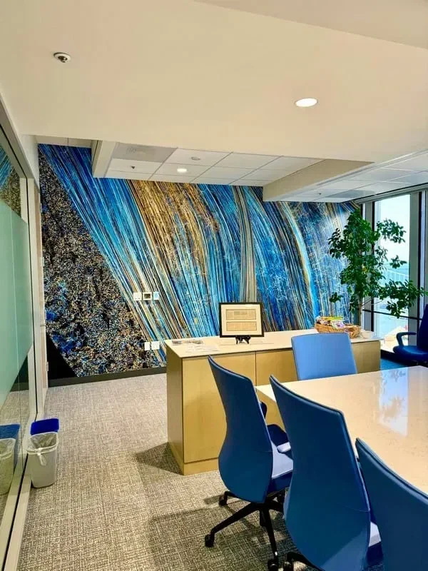 Blue botanical wallpaper used as a bold accent wall